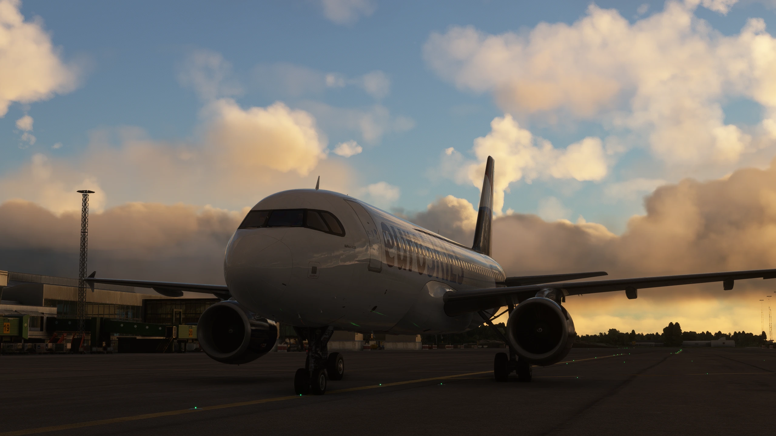 euroSKIES Airbus 320 in fair weather taxiing during sunset experience