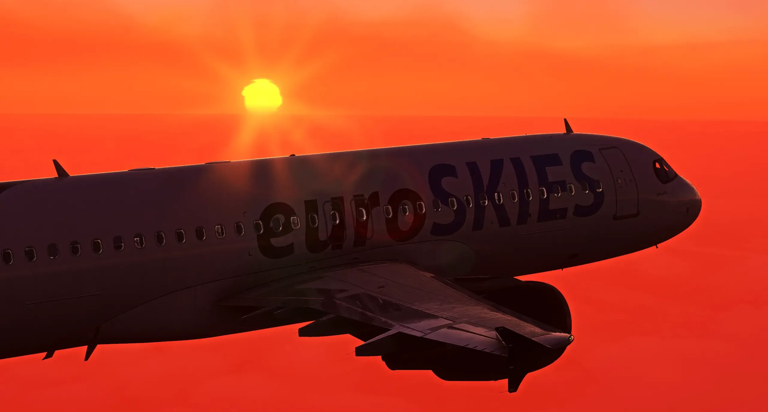 Close-up view of Fenix A320 euroSKIES virtual airline from the wingtip, with the aircraft and a sunset in the background.