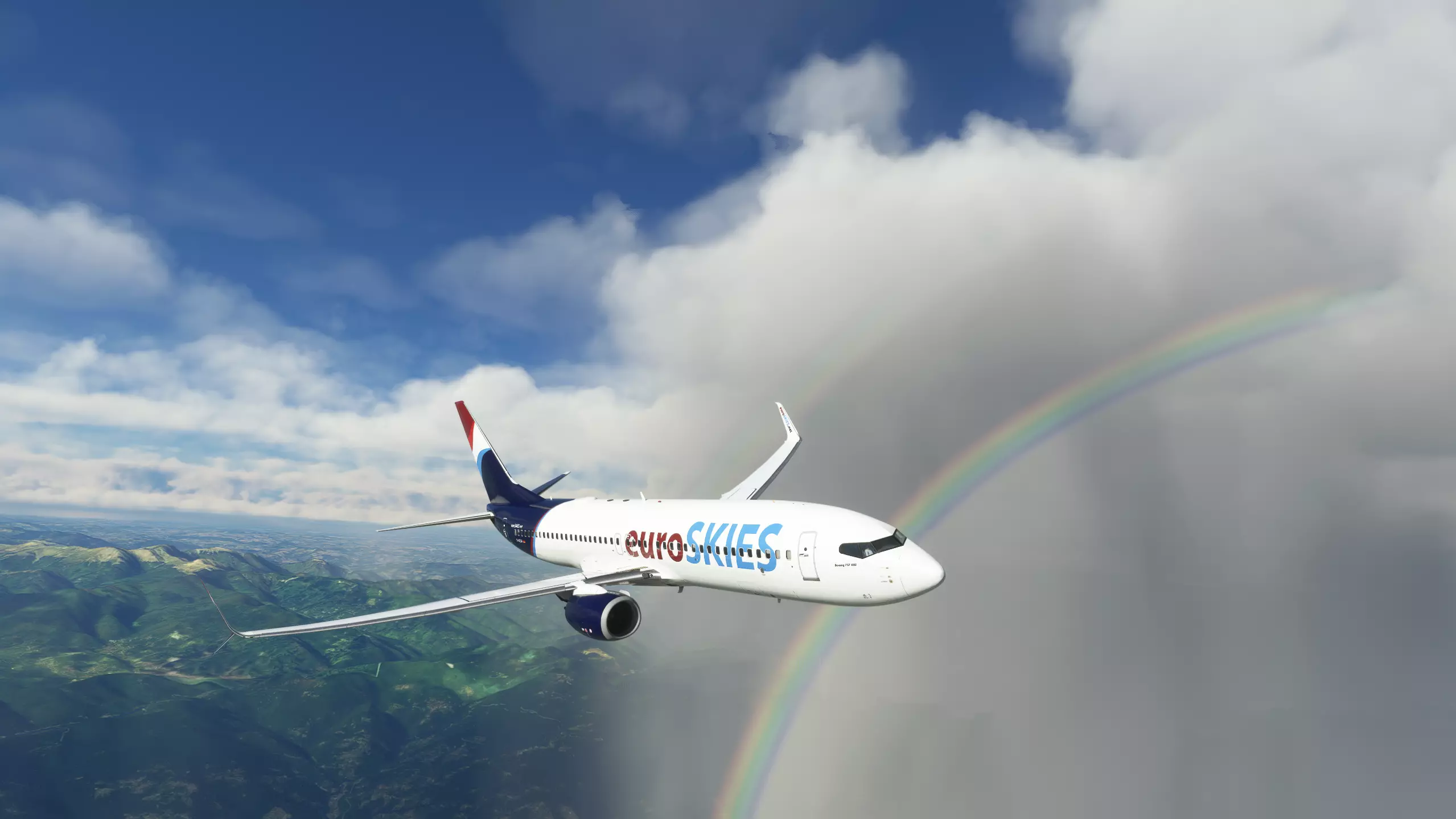 euroSKIES virtuelle Fluggesellschaft Boeing 737 im Fugbetrieb vor einem Regenbogen