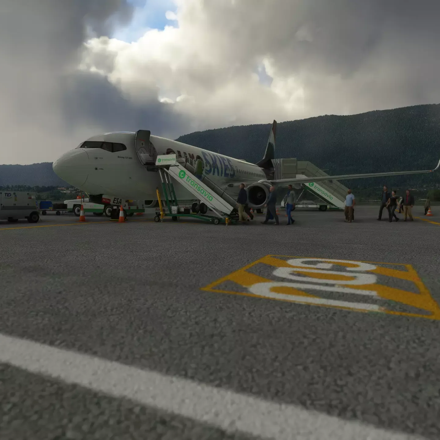 euroSKIES member boarding plane on ground