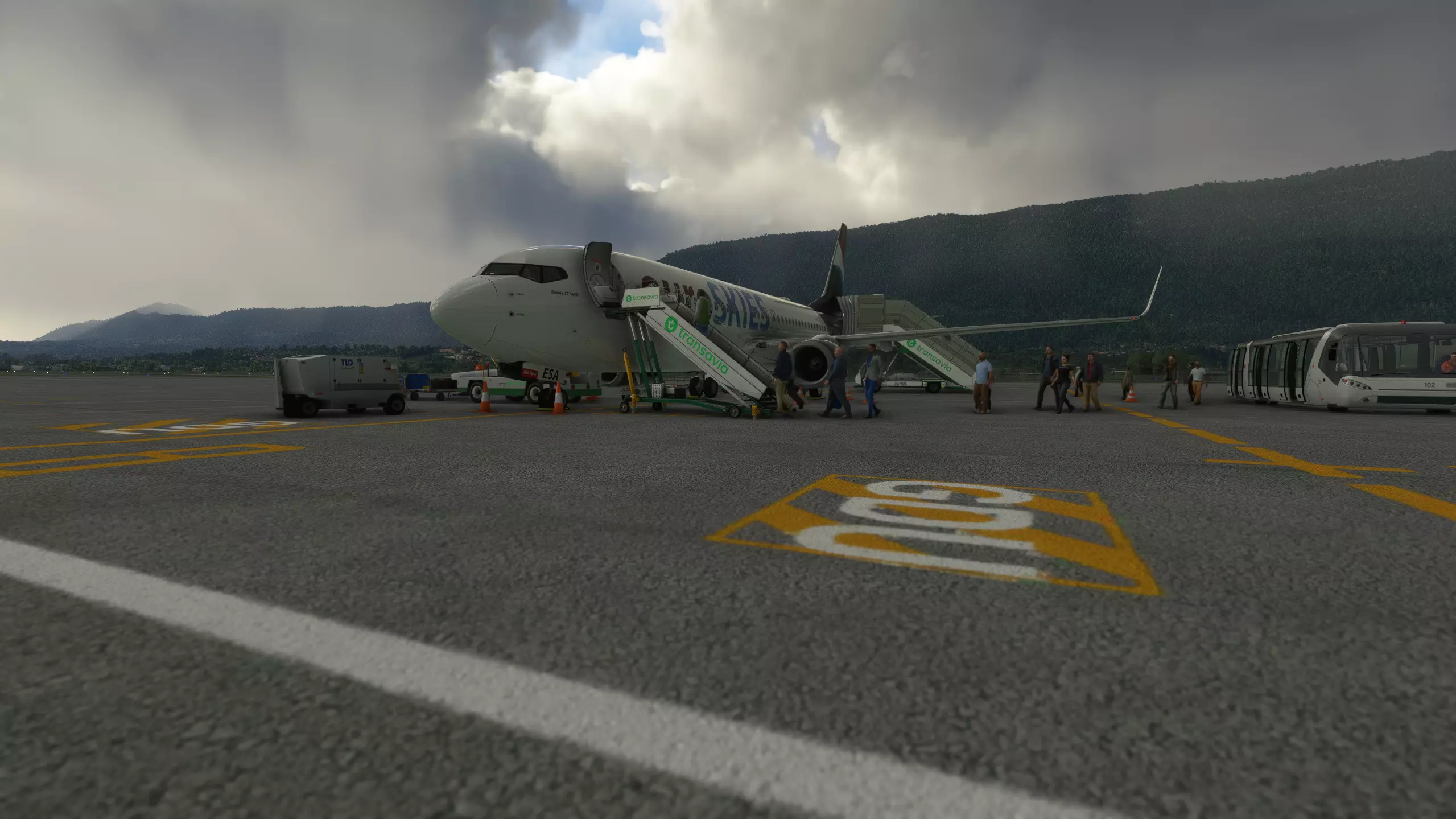 euroSKIES member boarding plane on ground